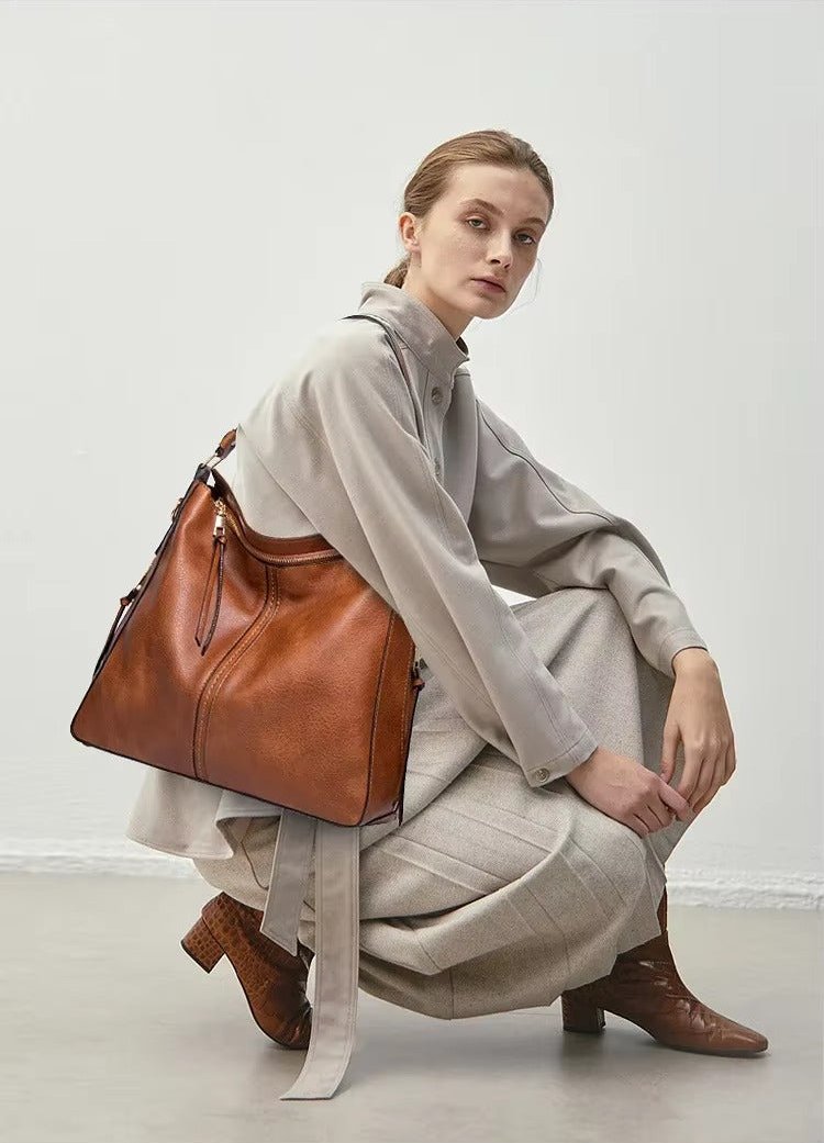 Caprielle - Elegant leather bag with large capacity and side pockets